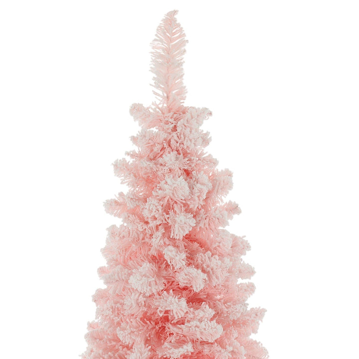 top of pink artificial christmas tree on white background