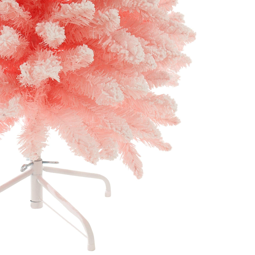close up of tree base with white metal stand and pink flocked branches