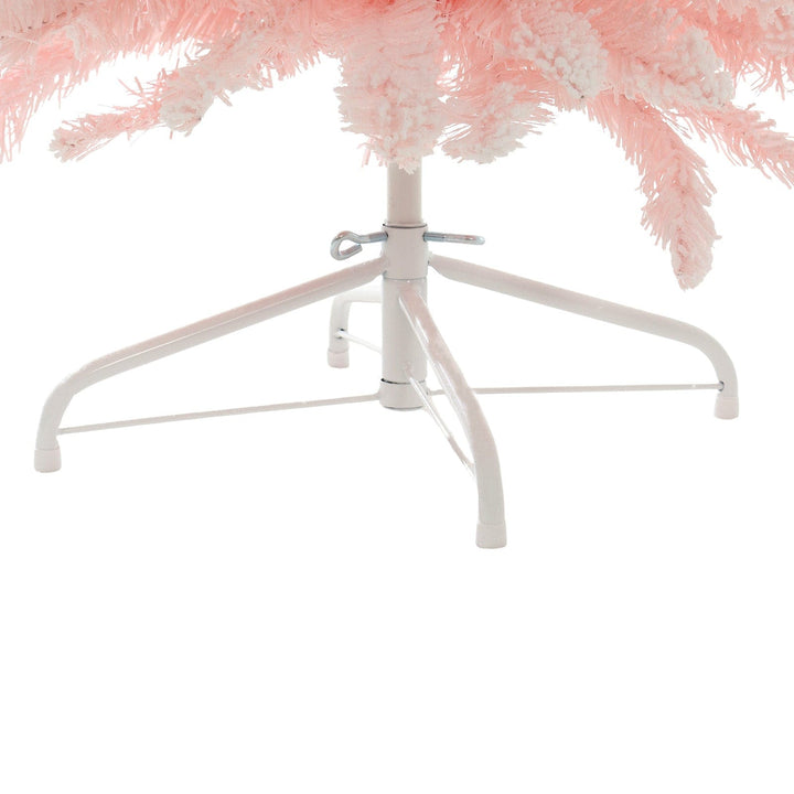 Close-up of a pink christmas tree with a white metal frame on a white background