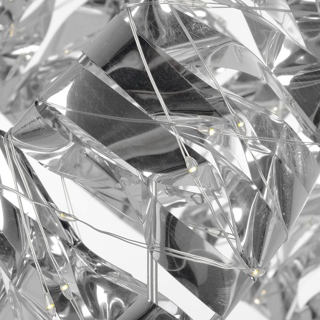 Close up of silver geometric shapes with LED light strings
