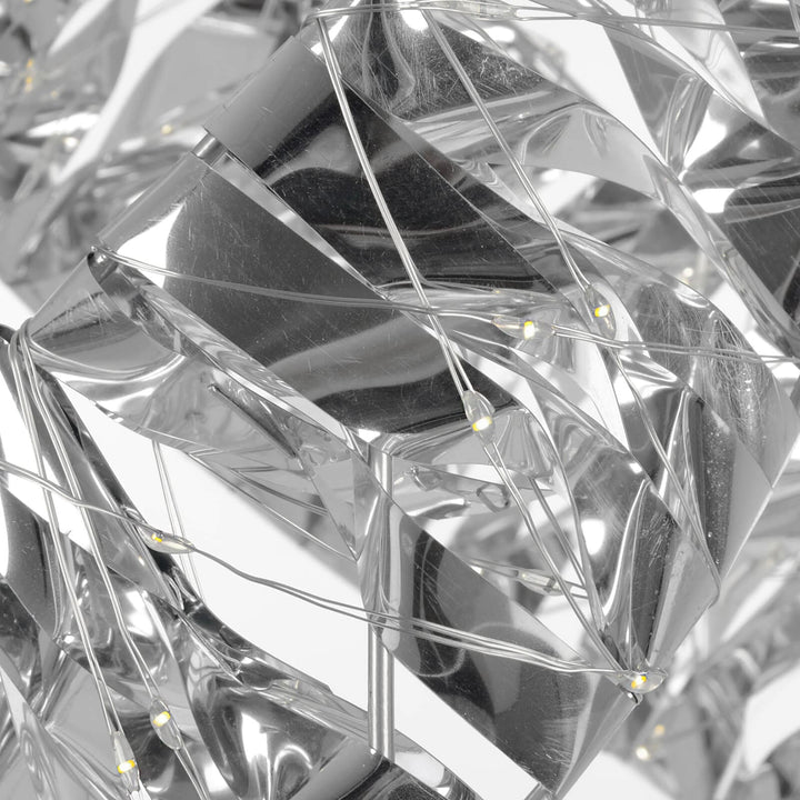Close up of silver geometric shapes with LED light strings