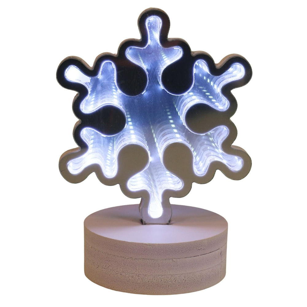 Decorative lamp with a snowflake design on a white background