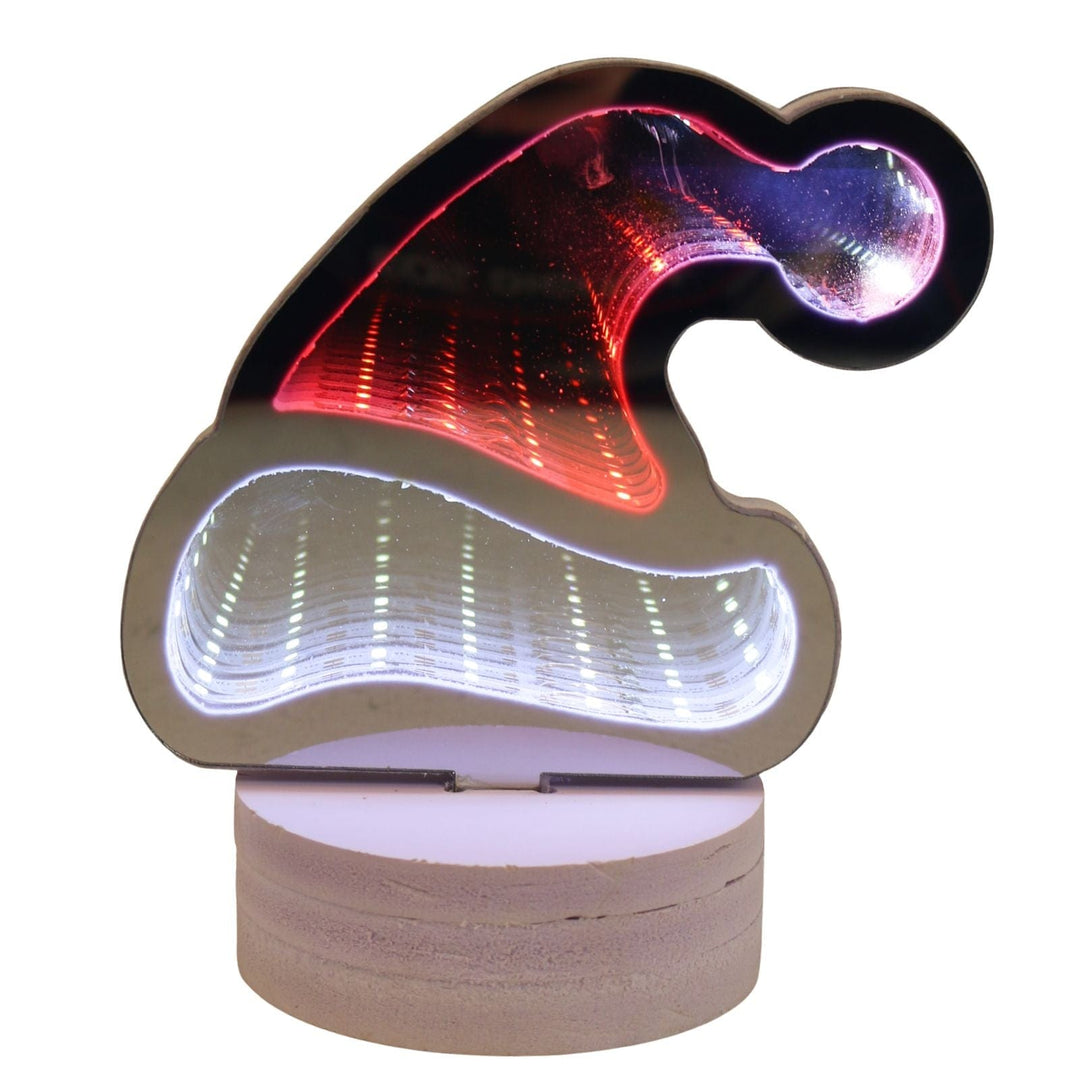 Decorative light shaped like a Santa hat with red and white colours on a white background