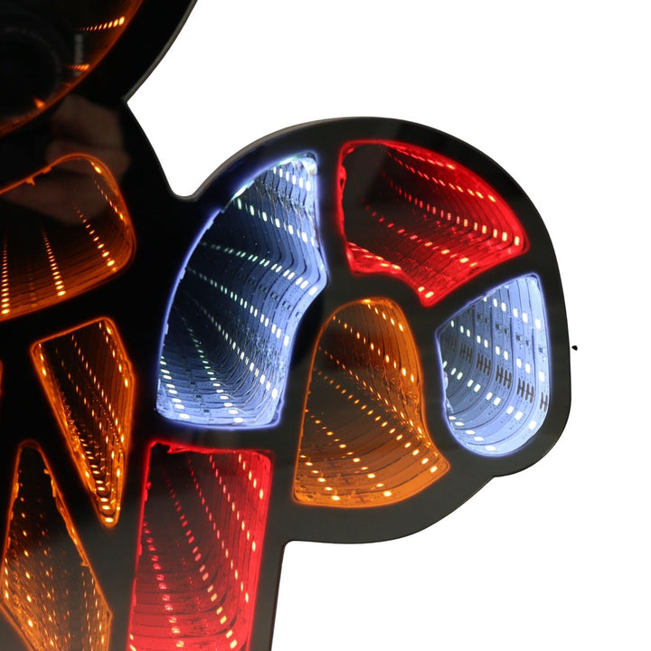 Close-up of infinoity light with red, blue, and orange lights on a white background