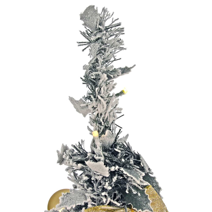 Decorative Christmas tree with silver and gold accents on a white background