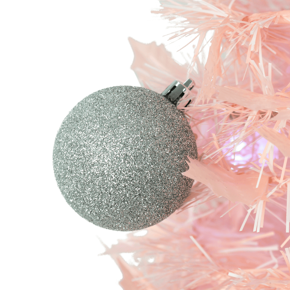pink tinsel tree with silver glitter bauble