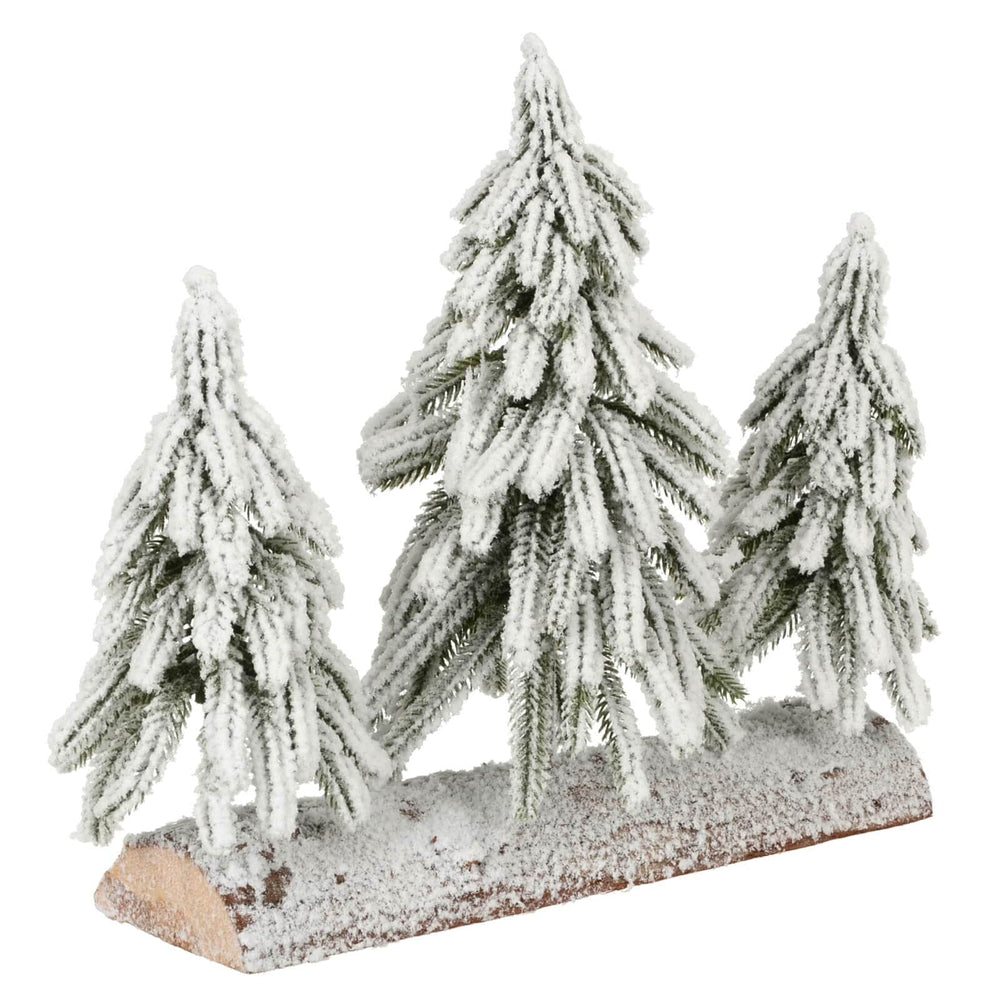 Decorative set of three frosted pine trees on a wooden base with a white background