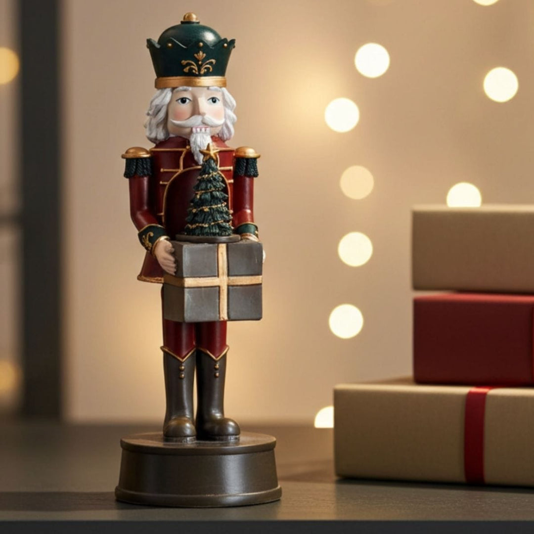 Nutcracker figurine holding a gift with Christmas lights and presents in the background