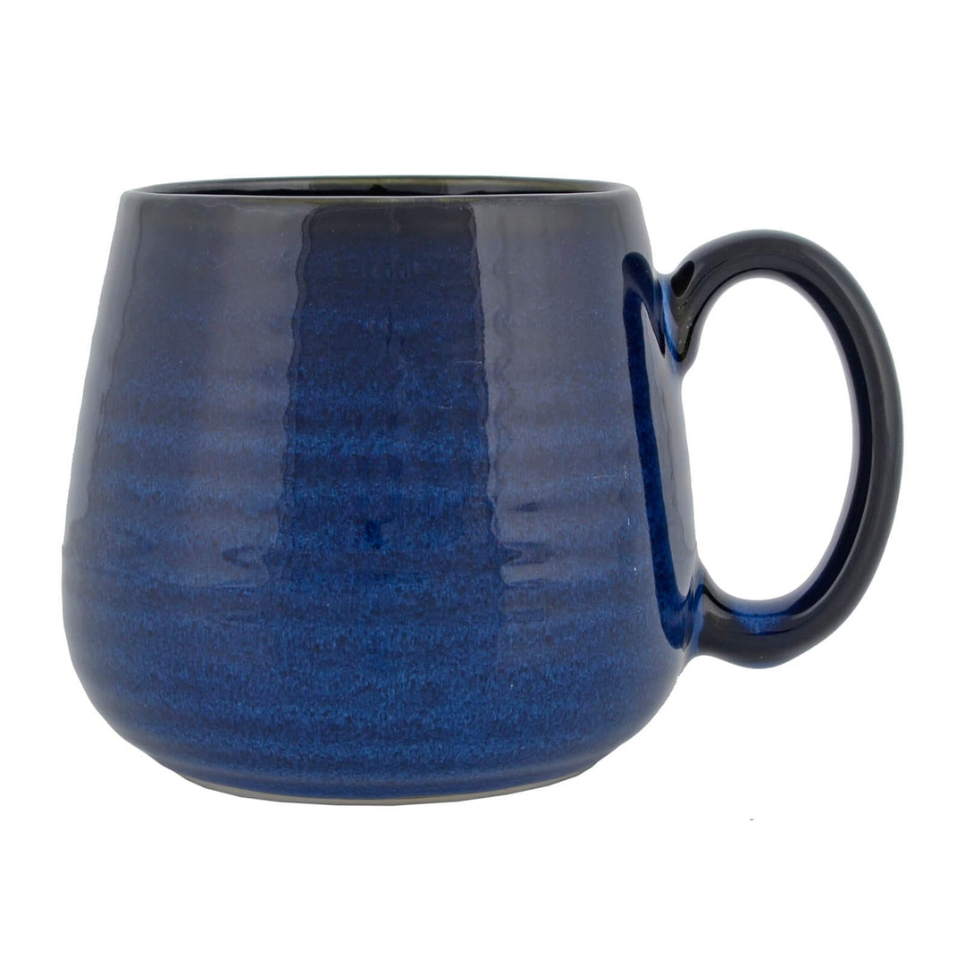Profile of a large blue ridged coffee mug with large handle