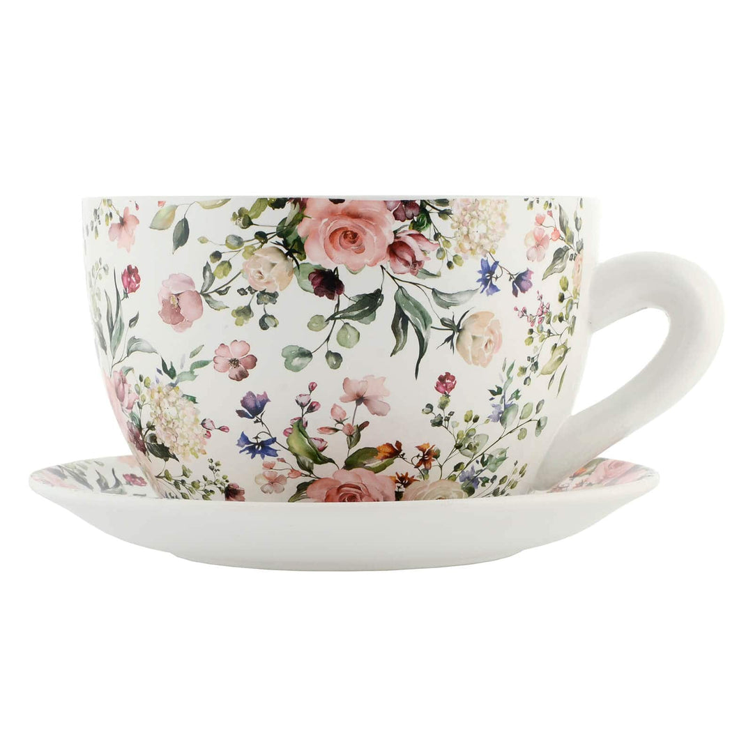 Profile of teacup and saucer planter with rose flowers pattern