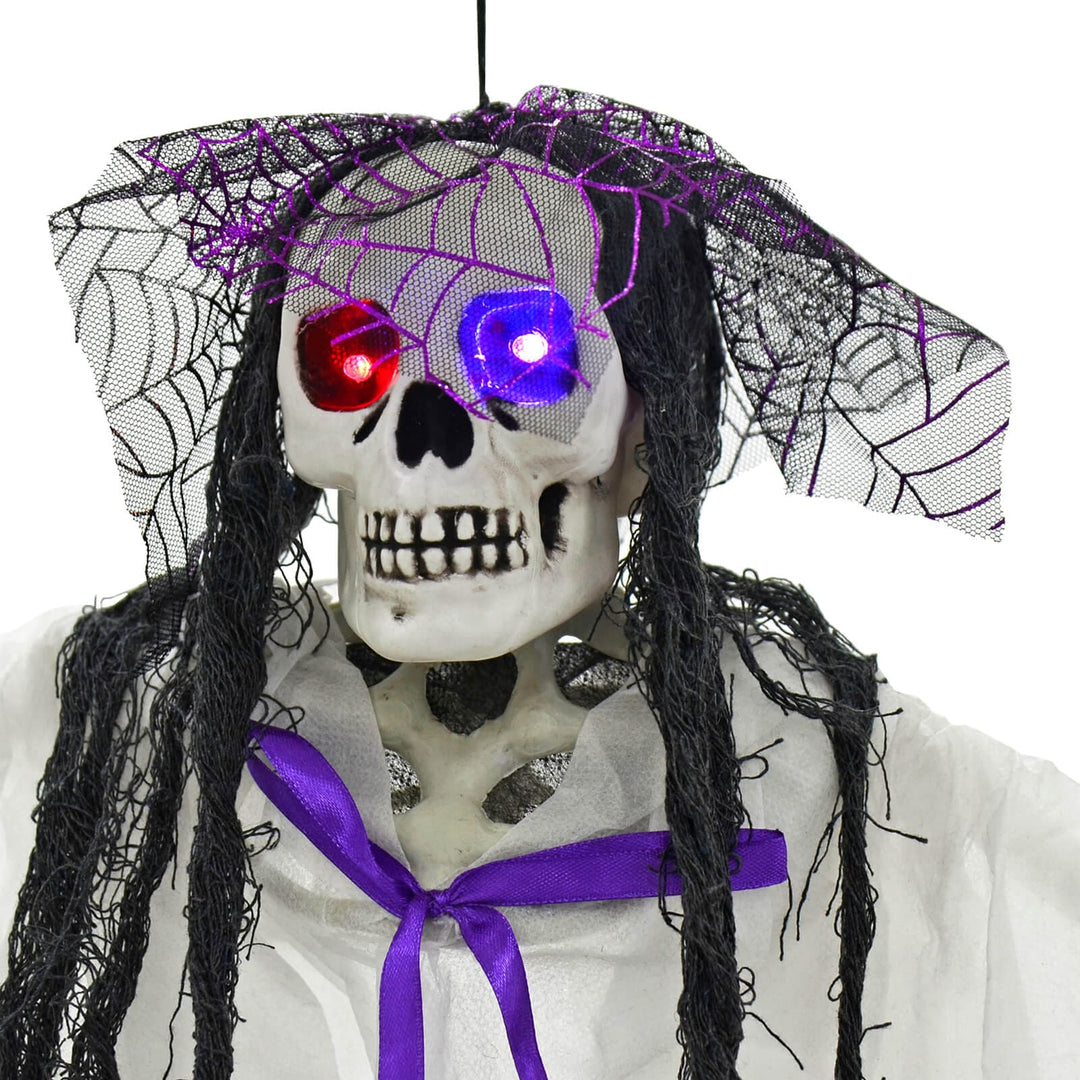 4ft Hanging Skeleton Flashing Eyes Purple Bow Webs Decoration